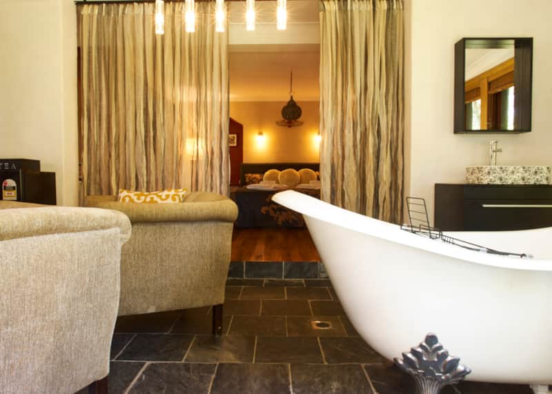 Studio Chill at Tomah Retreat, with a vintage clawfoot bath and fireplace