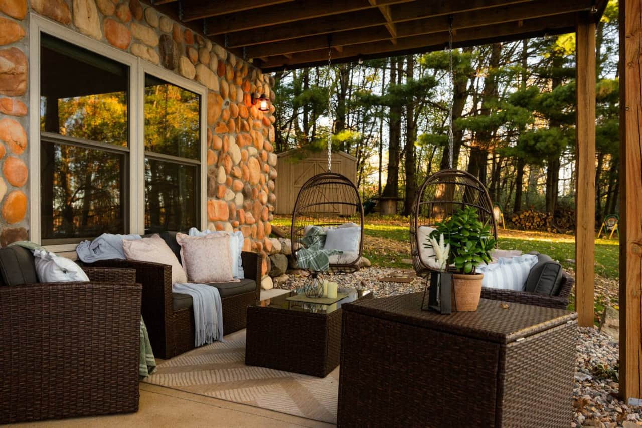 Your outdoor oasis awaits! Relax in cozy seating surrounded by nature and the peaceful charm of the lodge.