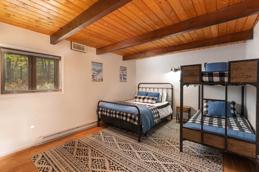 Bedroom #1 has queen and bunk beds with memory foam mattresses and top-rated pillows. 