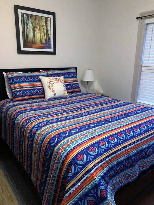 Queen size bed with Pioneer Woman bedding in 2nd bedroom. Queen size bed with Pioneer Woman bedding in 2nd bedroom.