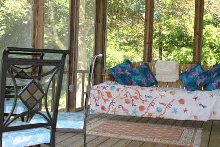 Screened in porch with swing