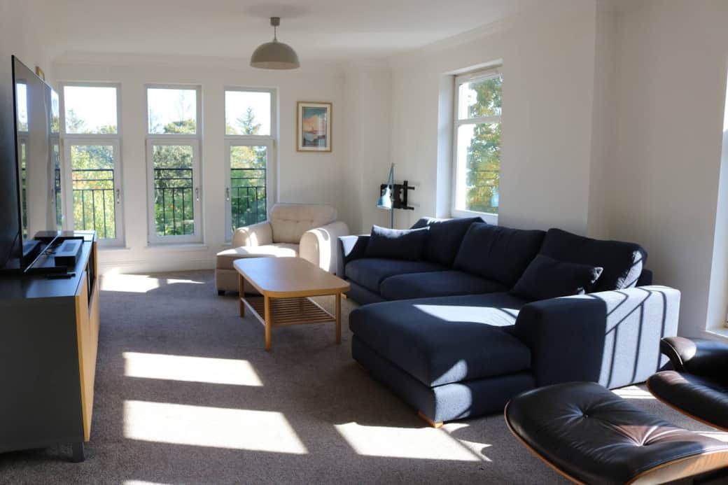 Living room seating, TV and sound system Living room seating, TV and sound system