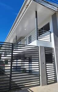 Main entrance. Smart deadbolt and automatic gates