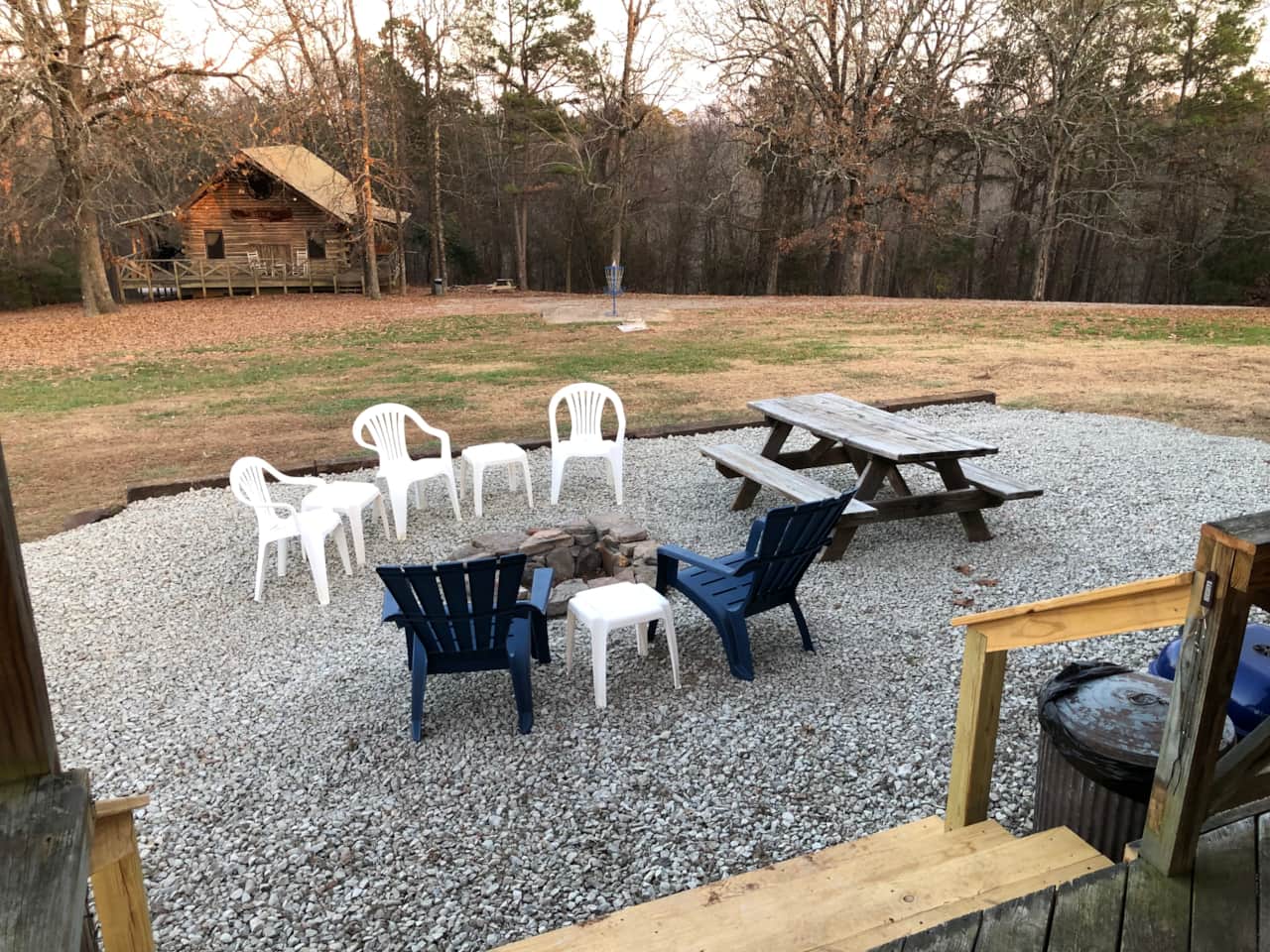 Your firepit area with picnic table and lights