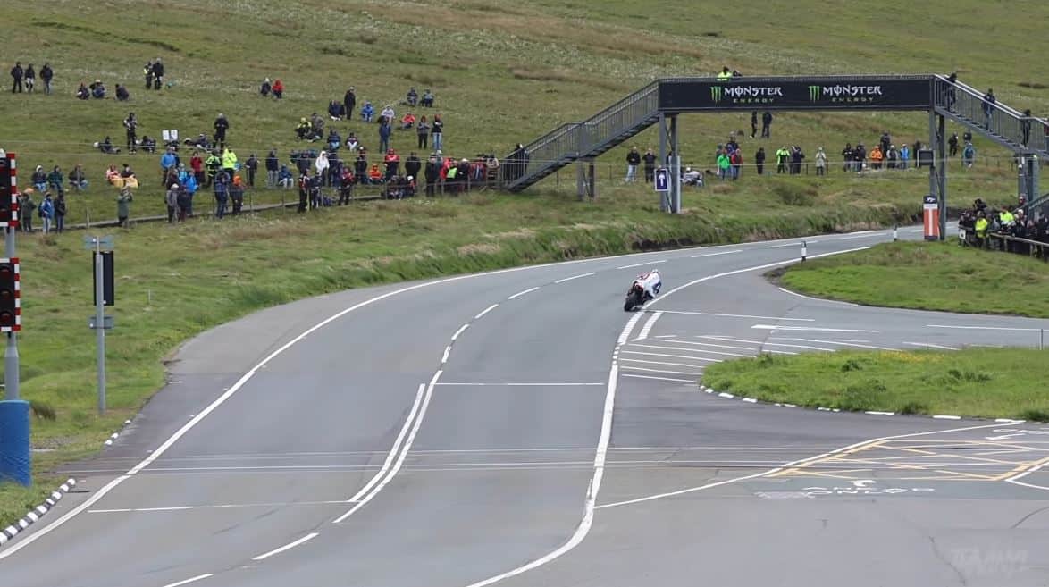Isle of Man TT riders passing the Bungalow on the Mountain Course