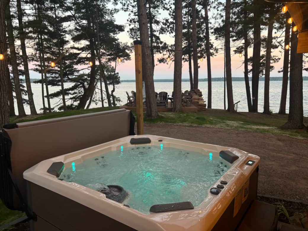 Hot tub with lake views.
