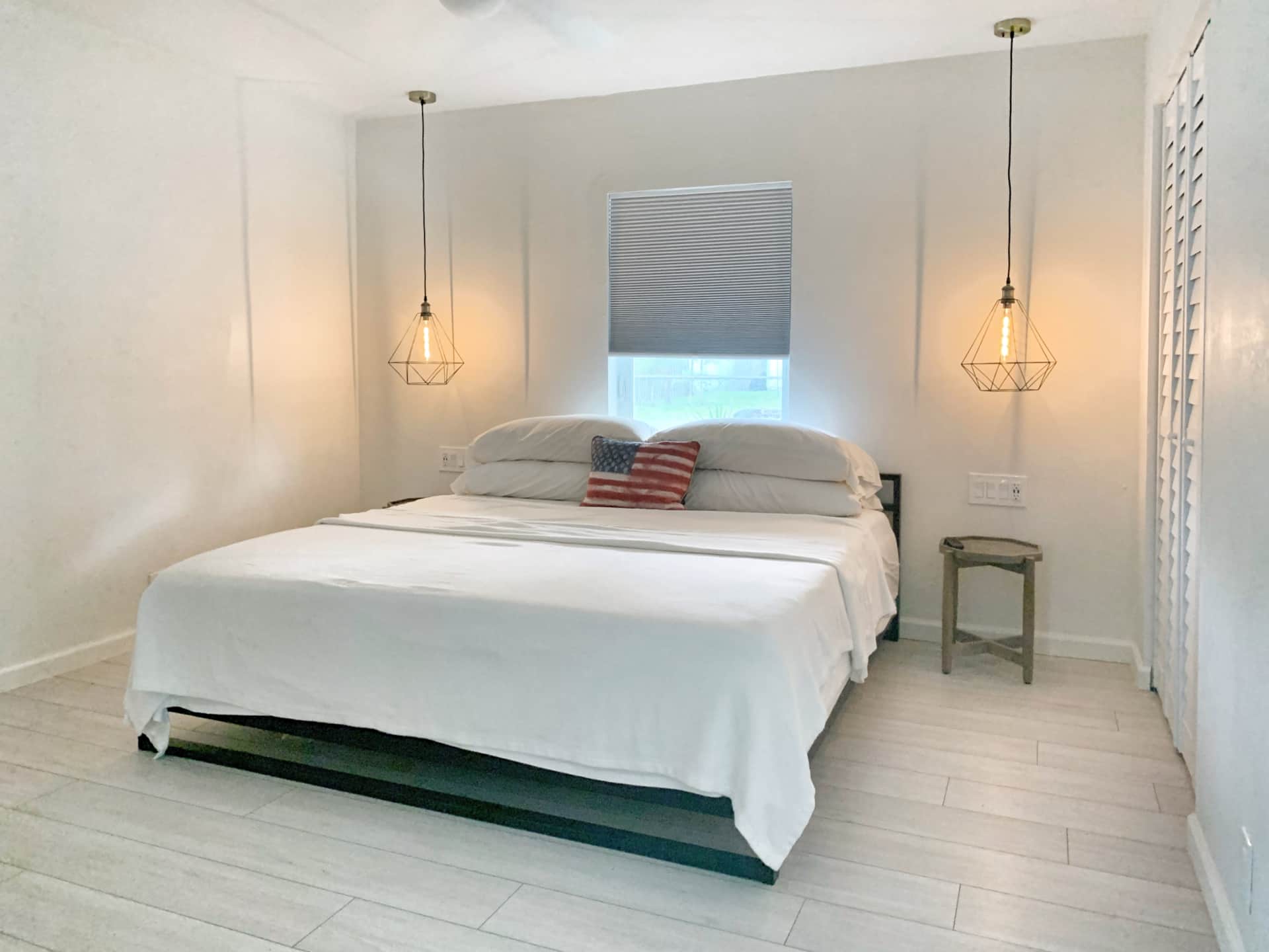 Light-filled renovated bedroom in Unit 2 at Casa Citron with central AC, expanded closet space, and a clean, modern interior.