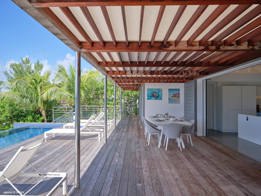 Outdoor terrace at Villa Pointe Milou designed for relaxing and dining