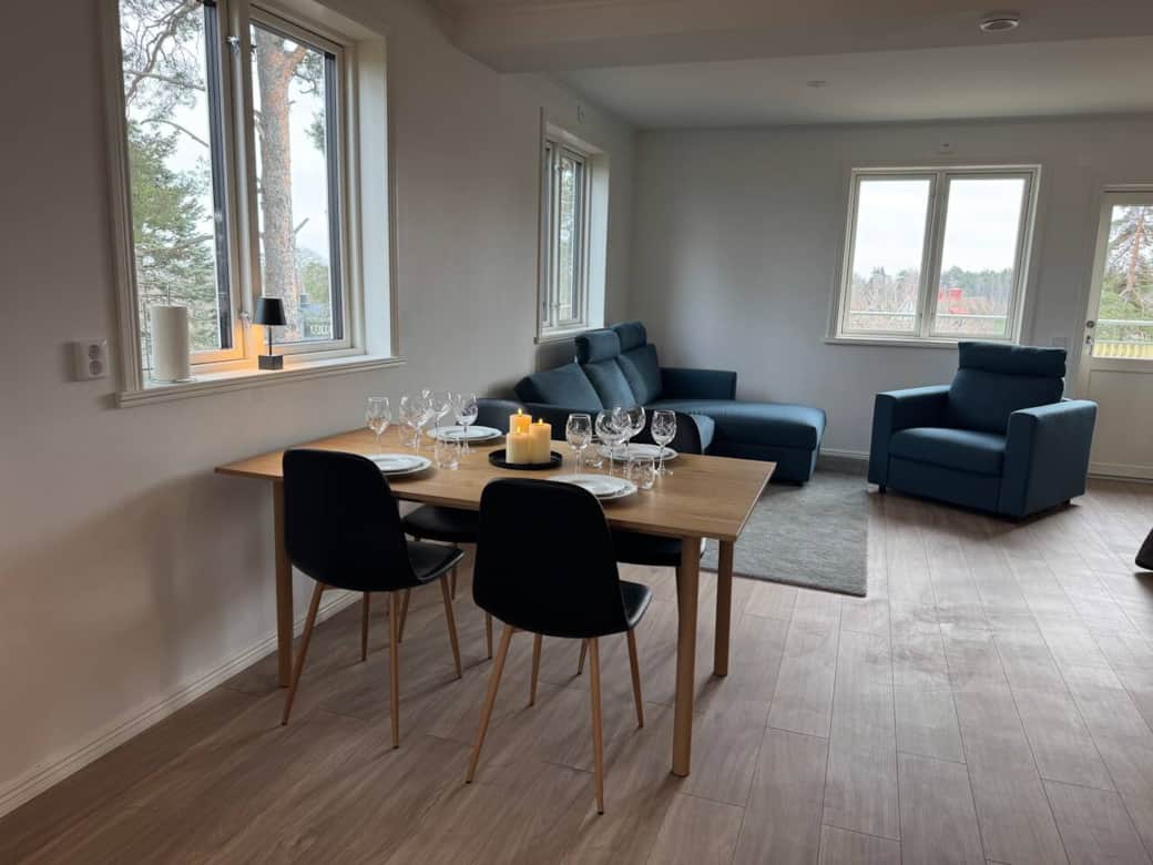Open-plan kitchen, dining area, and living room. Open-plan kitchen, dining area, and living room.