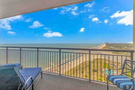 Endless coastline views stretching north from the private oceanfront balcony.