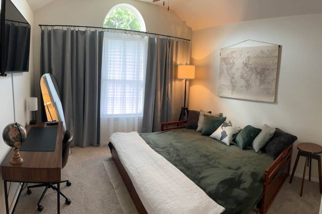Daybed converted to a full king with ample walk space. Daybed converted to a full king with ample walk space.
