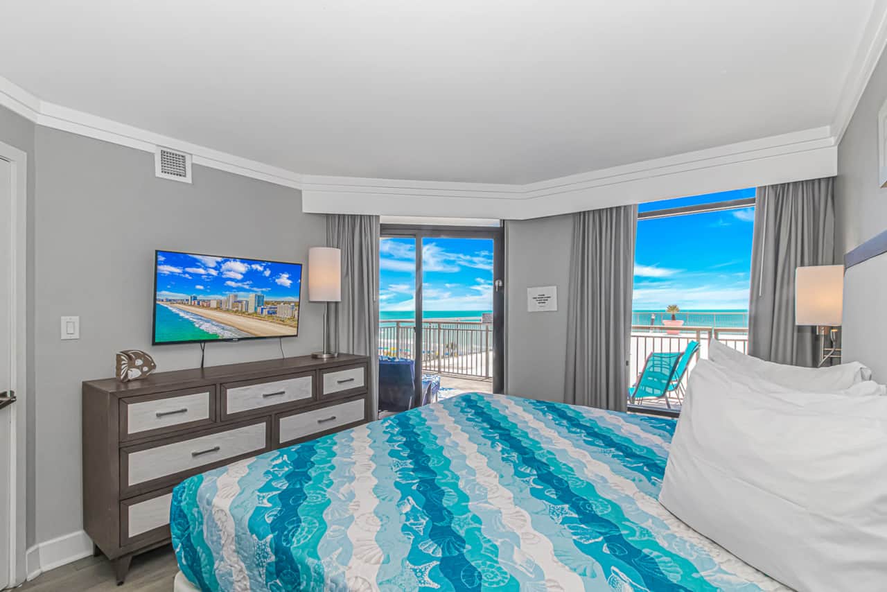 Enjoy stunning ocean views from the comfort of your king bed, complete with direct balcony access and modern coastal décor.