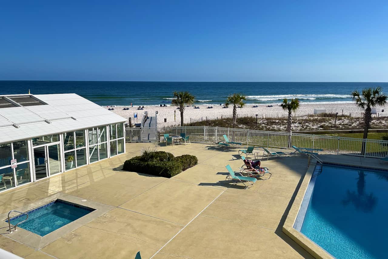Balcony view of indoor and outdoor Beachfront Pool Area at Perdido Sun Unit 210