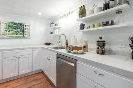 Sparkling kitchen has stainless steel full size appliances with a super quiet dishwasher 