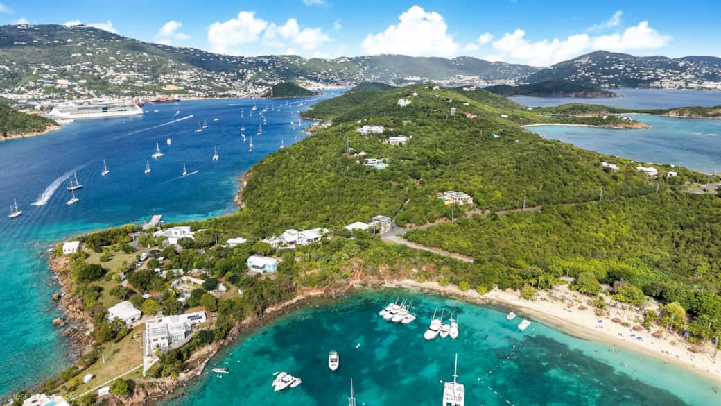Aerial View of Honeymoon Beach and Villa Serena on top of Providence Hill Road overlooking the bay. Aerial View of Honeymoon Beach and Villa Serena on top of Providence Hill Road overlooking the bay.