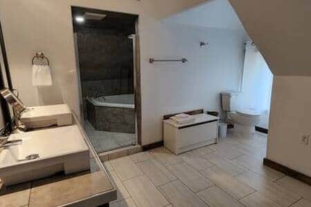 Spa like ensuite bathroom with relaxing two person jetted tub
