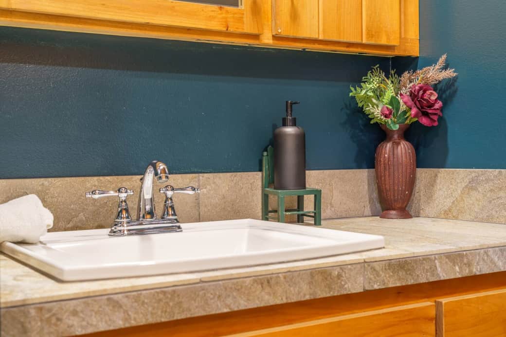Close up of our vanity with a deep sink and plenty of space for and toiletries.