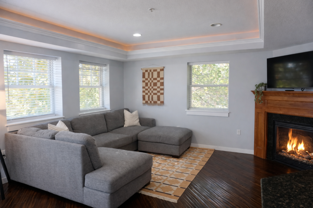 Cozy up by the real, working electric fireplace —perfect for relaxing evenings. 