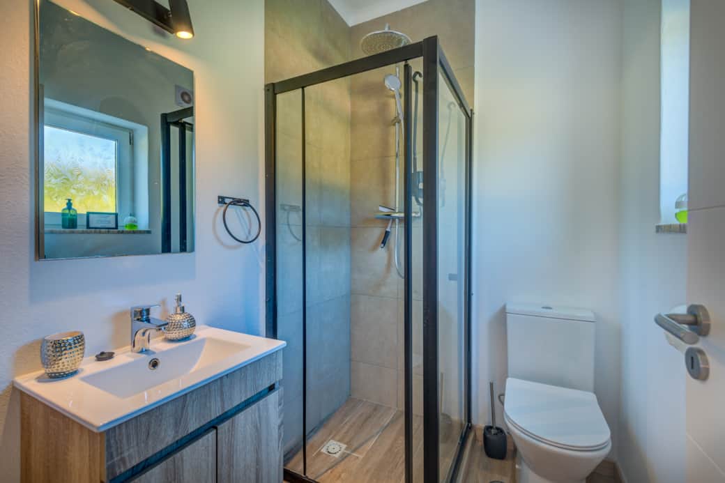 En suite bathroom to bedroom 1