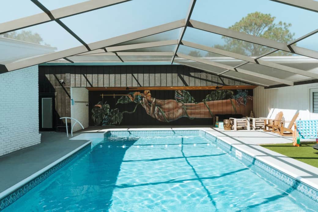 Resort-style pool oasis connecting both villas, perfect for group stays and full-property rentals