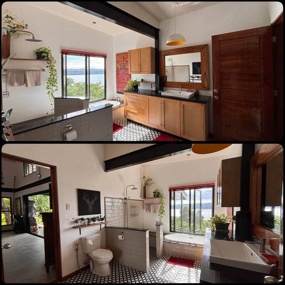 The upper level bathroom with shower and a bathtub  looking out to the ocean.  It is accessed from the main bedroom on the ground floor and through the living room. The upper level bathroom with shower and a bathtub  looking out to the ocean.  It is accessed from the main bedroom on the ground floor and through the living room.