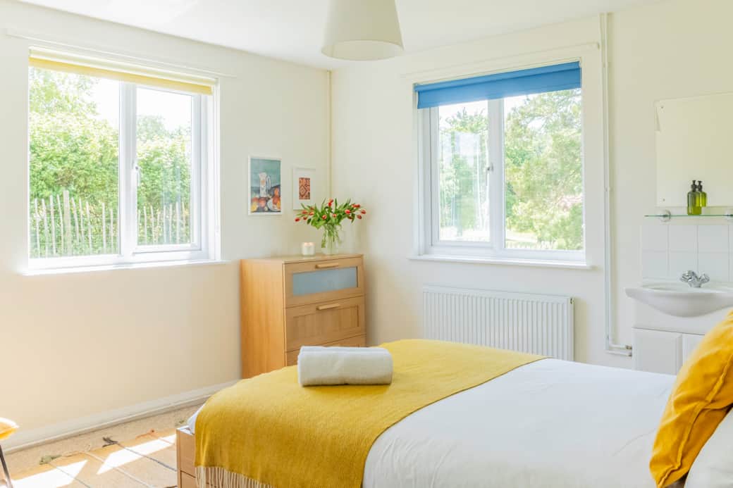 Master bedroom | Double aspect windows and sink