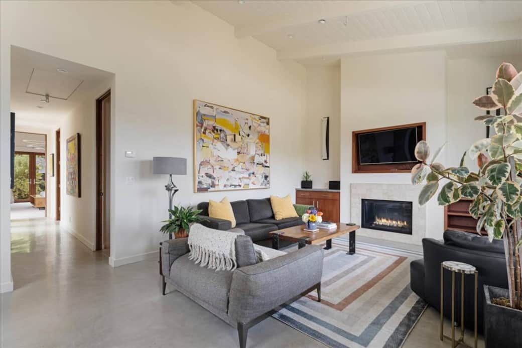 American Leather Couch and Roche Bobois chair and chaise lounge chair, with state of the art TV