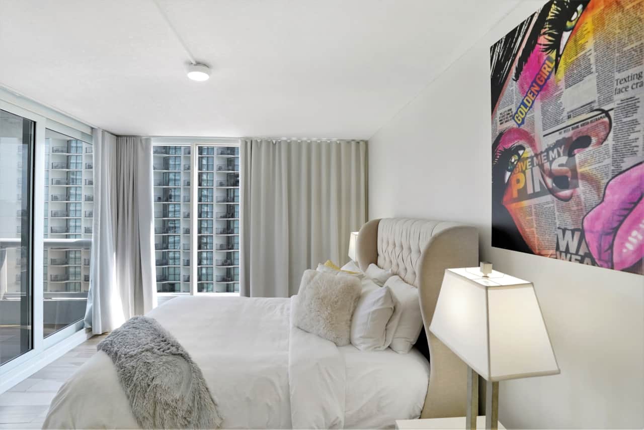 2nd master suite, queen bed, balcony access, walk in closet, private bathroom, tv