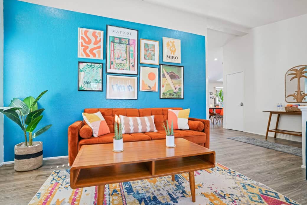 The Funky Palm is NOT afraid to embrace color, art, and fun. Enjoy our groovy living room with Roku TV and fast mesh WiFi internet. One of the two sofas is a pull out bed, to have many sleeping options for guests.
