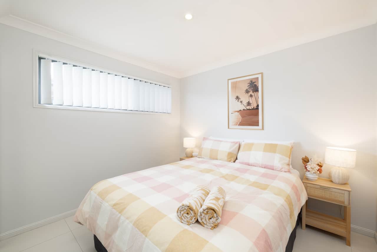 Bedroom 1: Peaceful bedroom with cozy design and ample storage