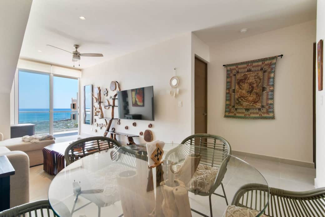 Dine for four with silverware and stunning Caribbean Sea views.