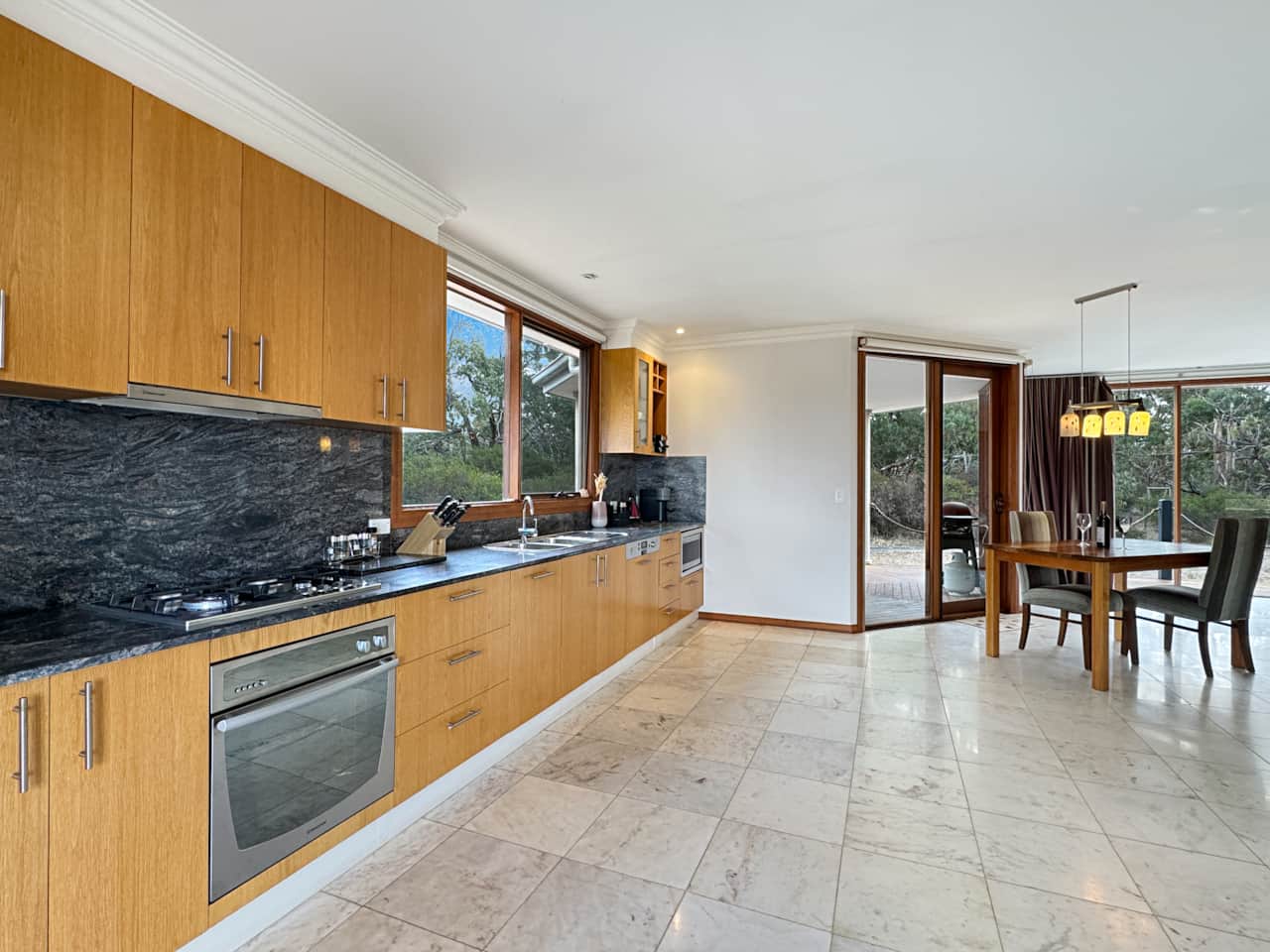 Enjoy a full kitchen with a coffee machine for gourmet indulgence.