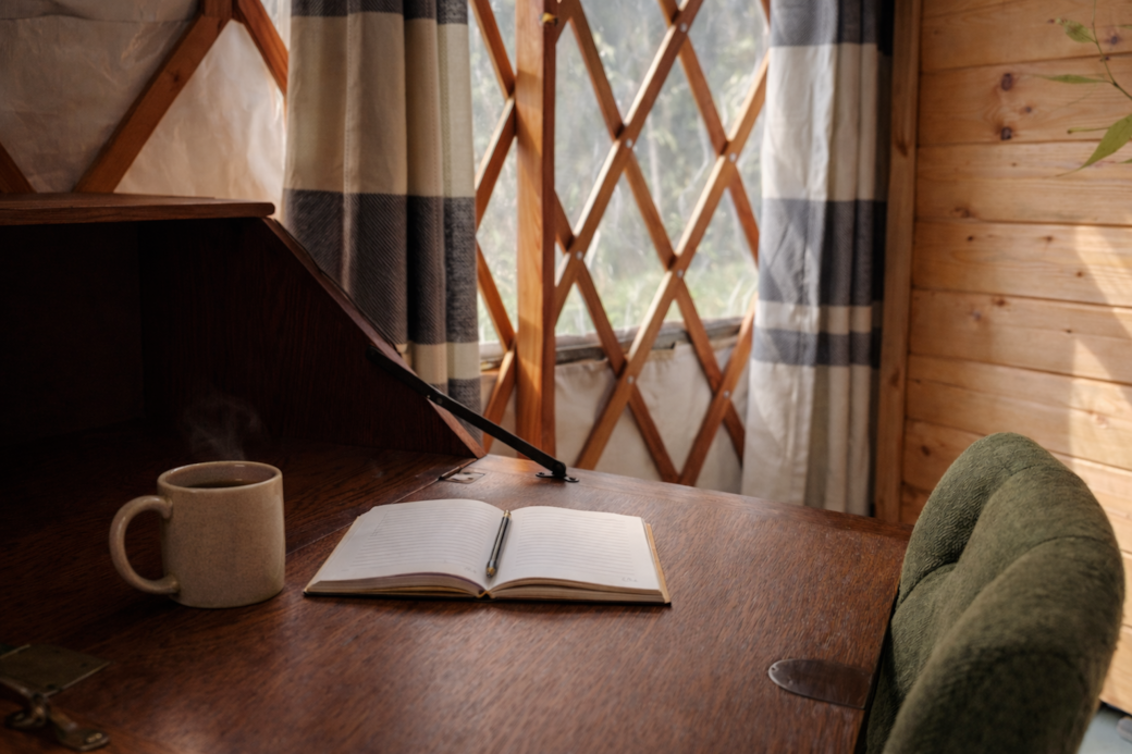 Quiet writing nook inside the yurt overlooking the pasture.