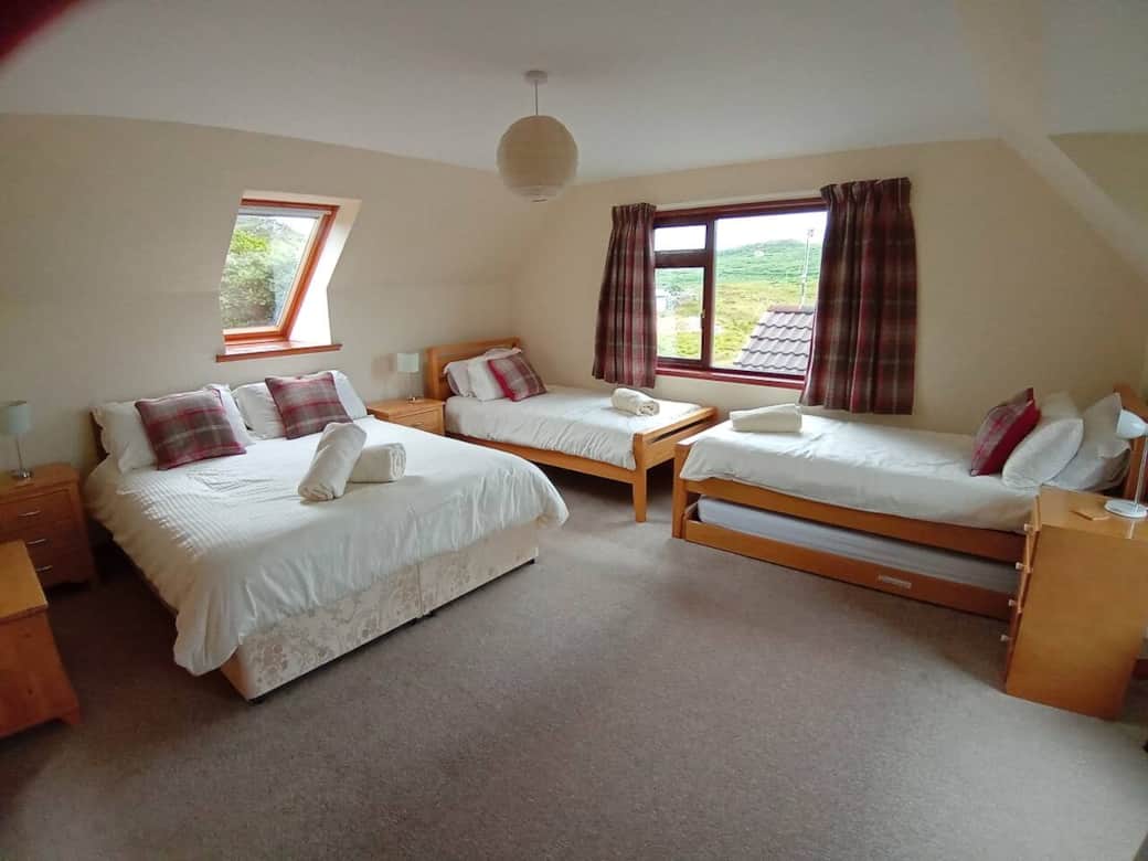 Family Bedroom - Sleeps 4.  (trundle bed can be used if you need 4 separate beds. )