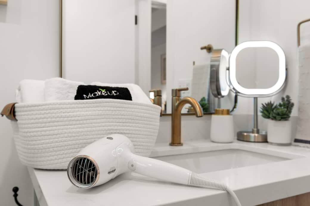 Hand soap~Shampoo~Conditioner~Shower Gel~Hair dryer~Hot water~Bathtub~Large High Pressure Rain Shower Head ~Make-up Mirror~Make-up Removal ~Hand Towel~Toilet Paper~Cleaning Supplies~Lots of storage for your Toiletry bag and Bathroom Essentials