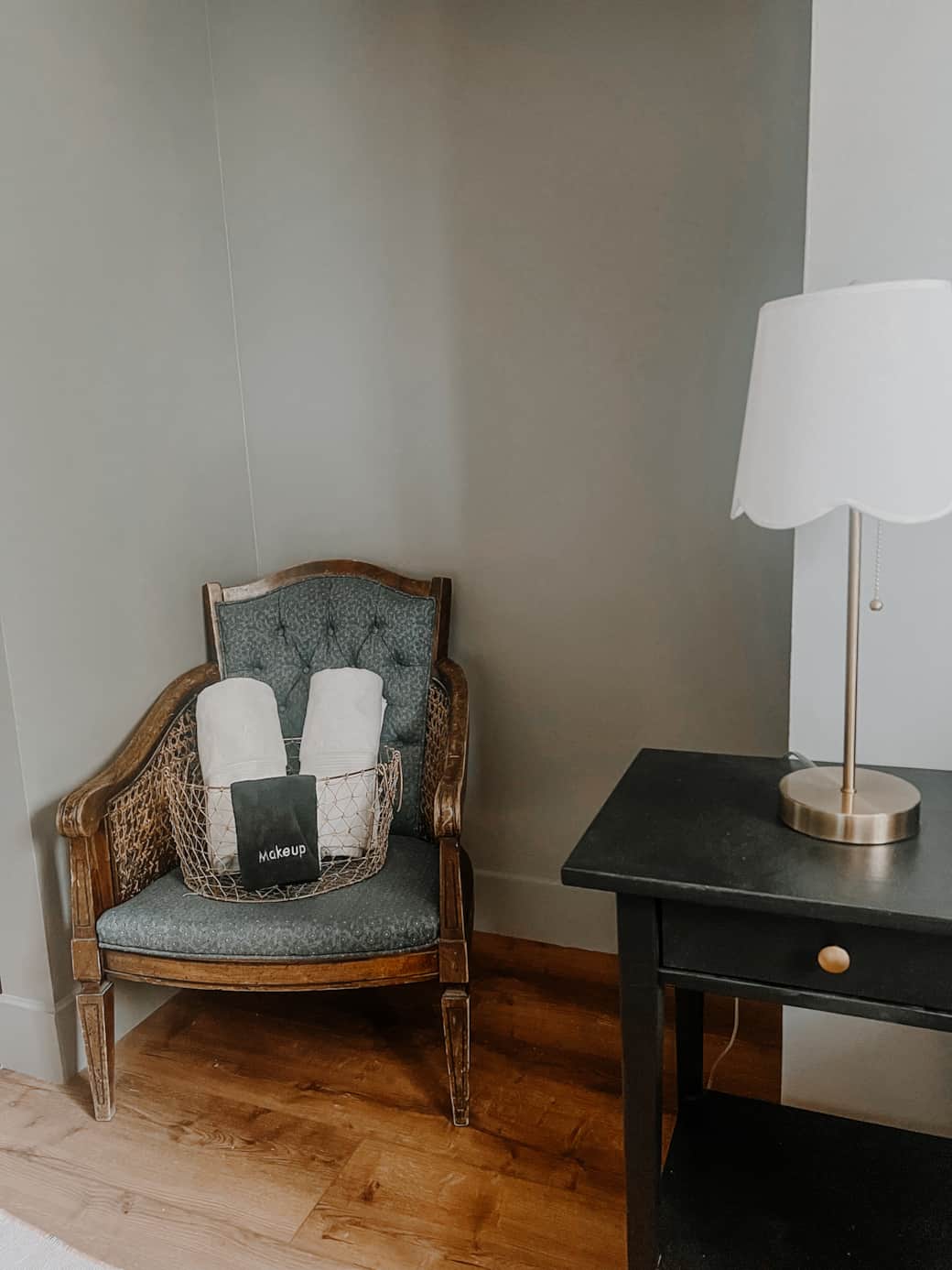 Quiet nook with an antique chair, where you'll also find your personal linens.