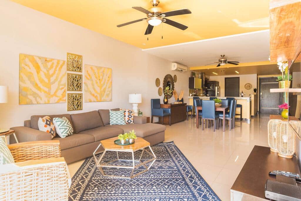 The living room sectional opens to a queen-size sofabed for additional sleeping space