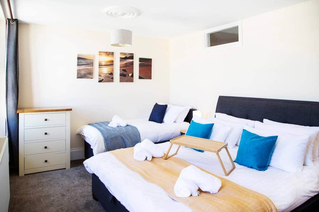Second Bedroom With SuperKing And Single Beds