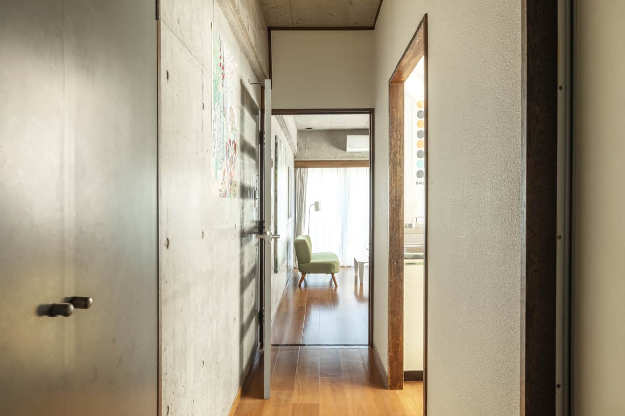 Bright wooden floors and open sightlines throughout the flat