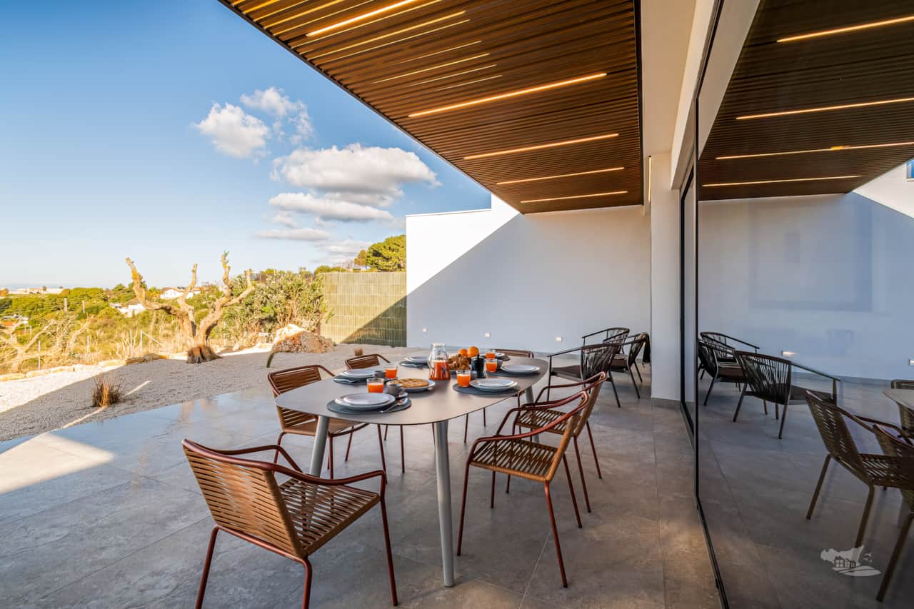 This inviting veranda is perfect for al fresco dining. 