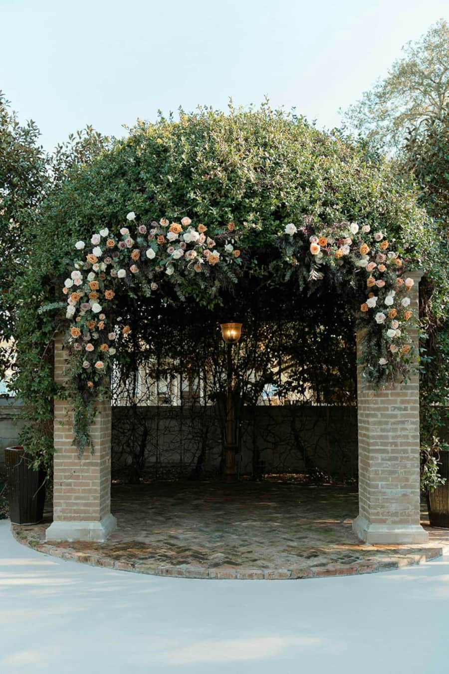 Gazebo wedding ceremony setup in the gardens of The Bryan Museum