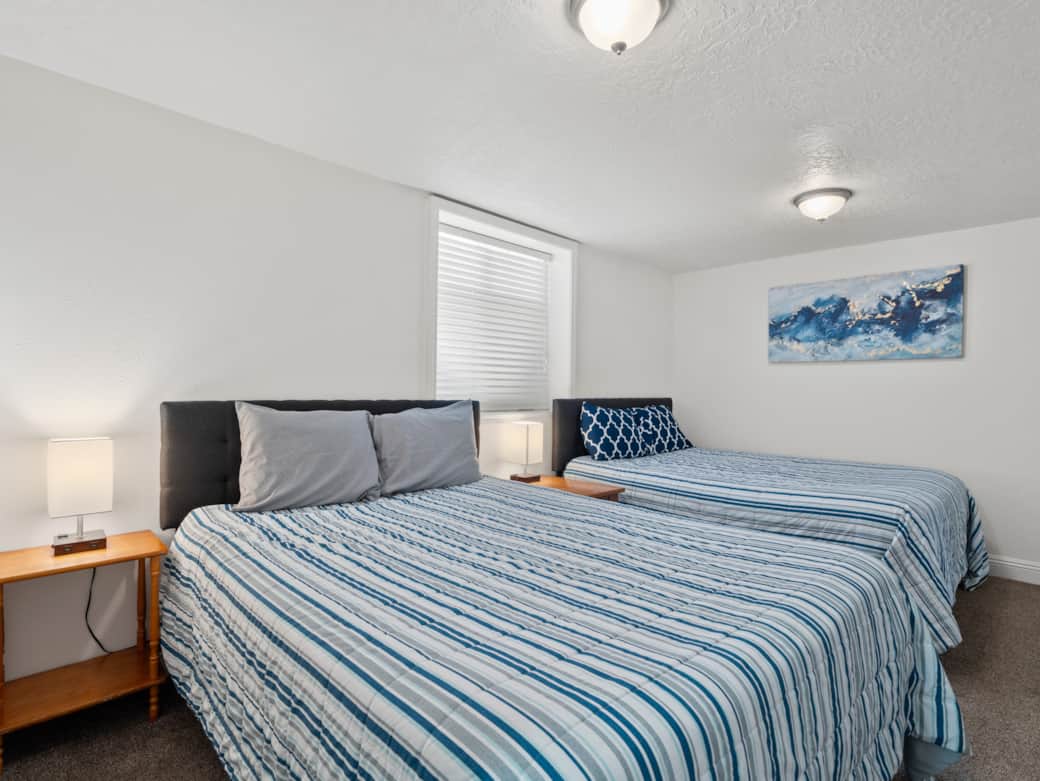One room on the lower level has two queen beds - perfect for people who need a little extra room.