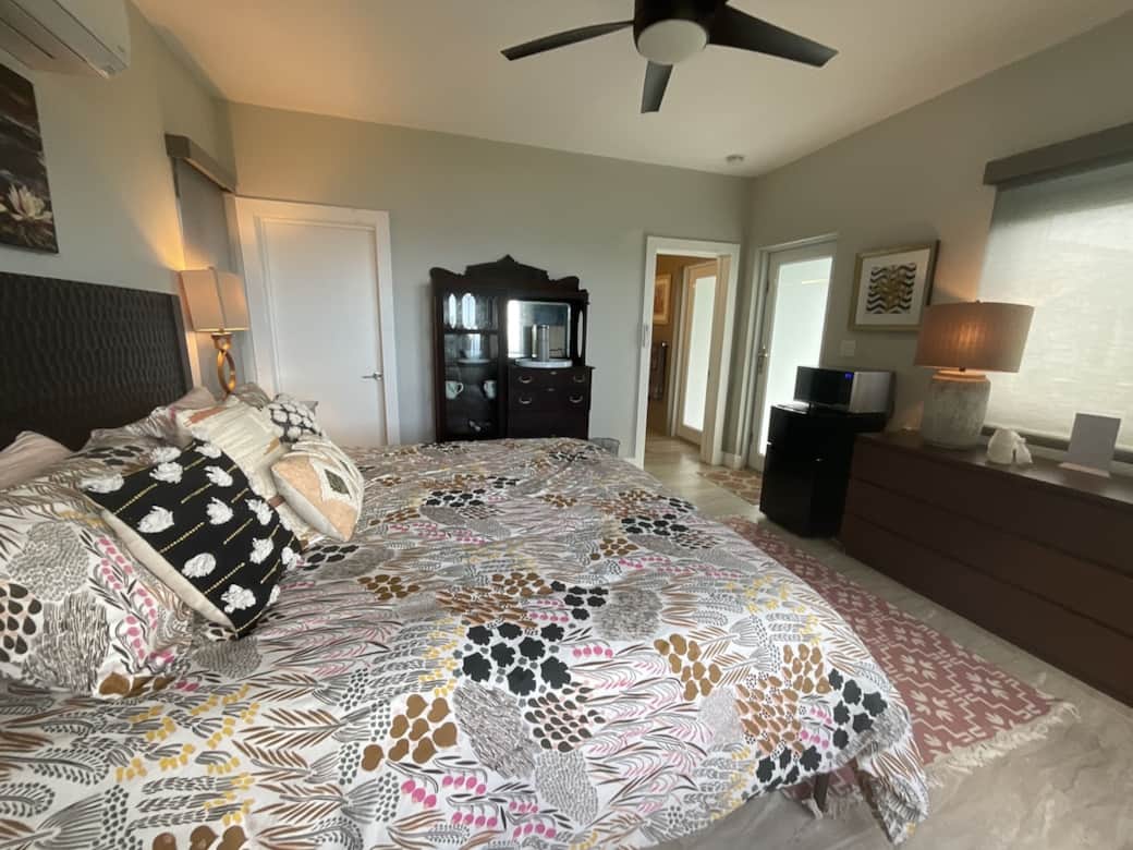 Suite with mini fridge, microwave, coffee makers, and limited kitchen supplies