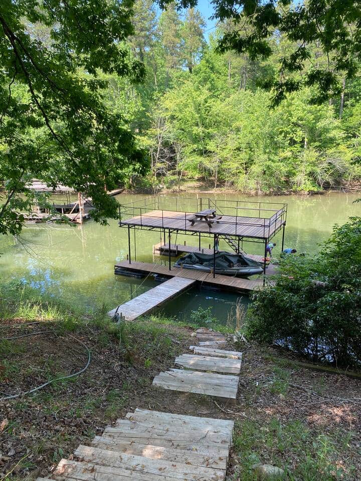 "Party" dock with canoe. You're welcome to bring your own boat or rent one nearby!