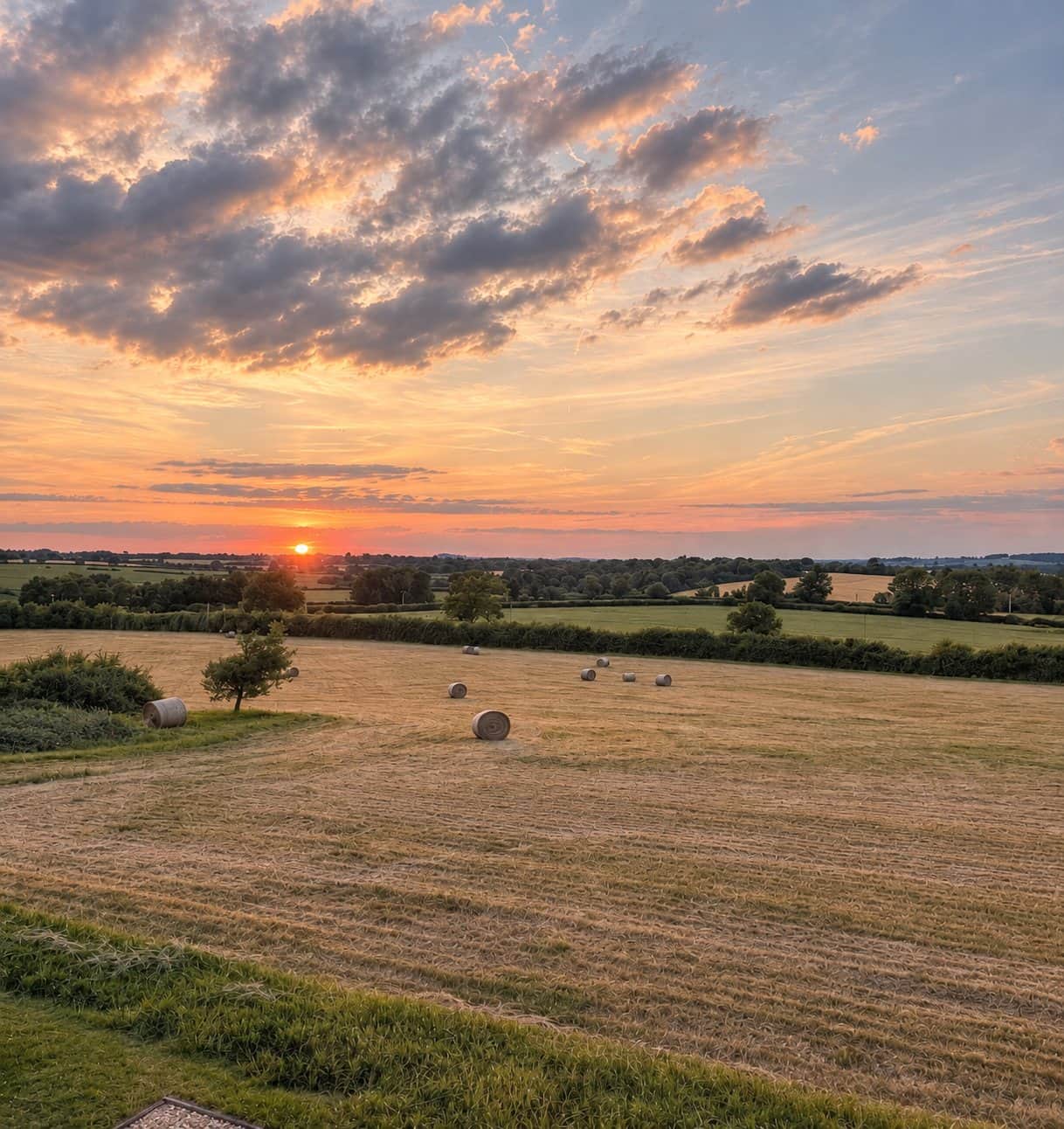 The Cotswold Barn surrounded by its hilltop countryside