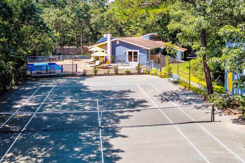The tennis court.