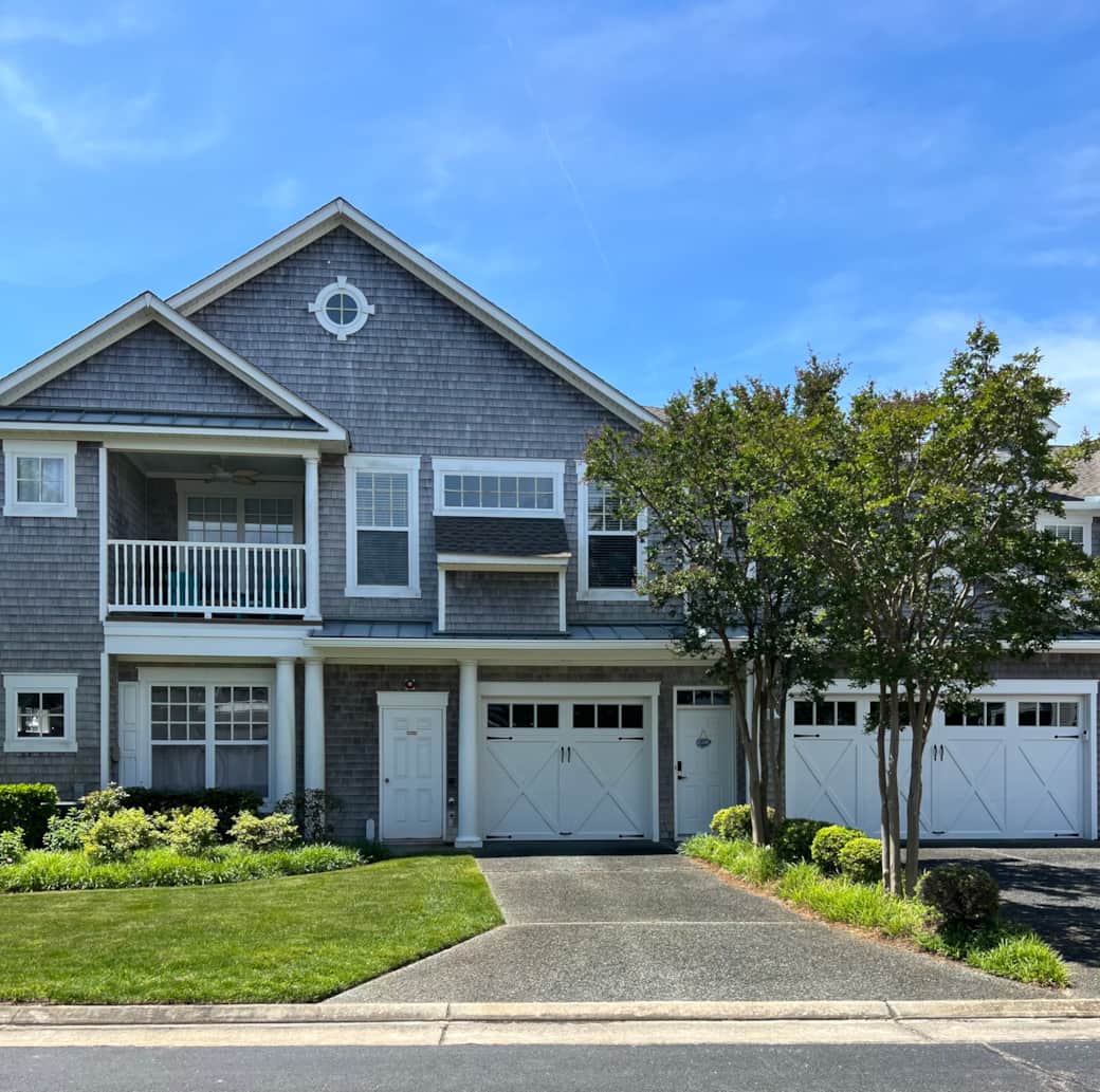 Upper floor and two car garage to the right
