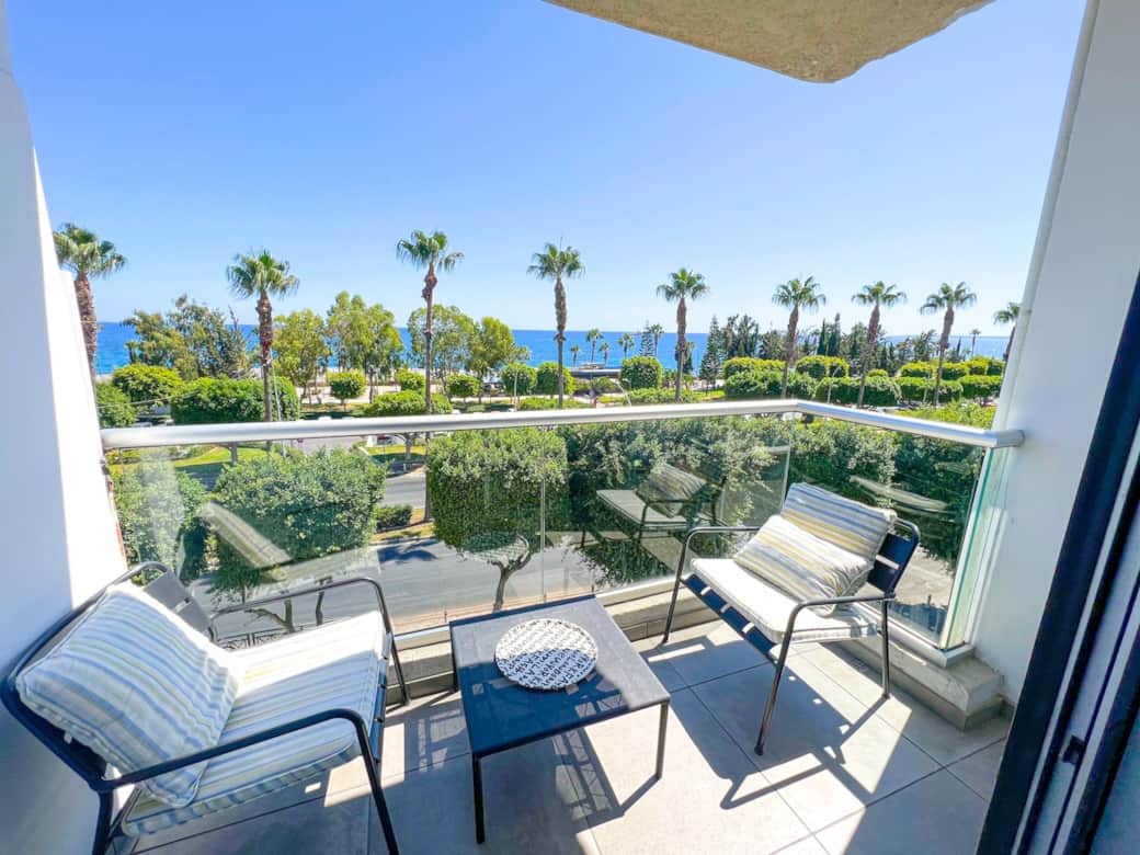 Enjoy a glass of wine and the sunshine from our amazing balcony overlooking the Mediterranean sea