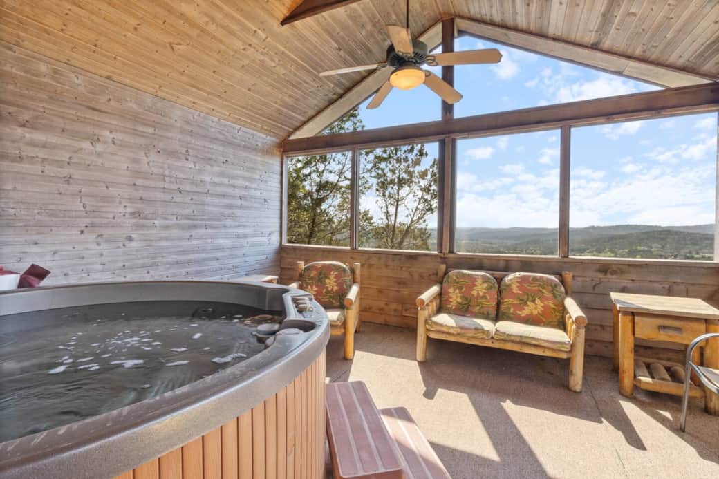 This hot tub room is the perfect spot to enjoy a relaxing dip in the tub while admiring the breathtaking views. This hot tub room is the perfect spot to enjoy a relaxing dip in the tub while admiring the breathtaking views.
