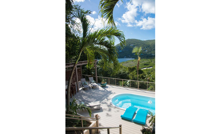 View of the pool from the exterior side entrance